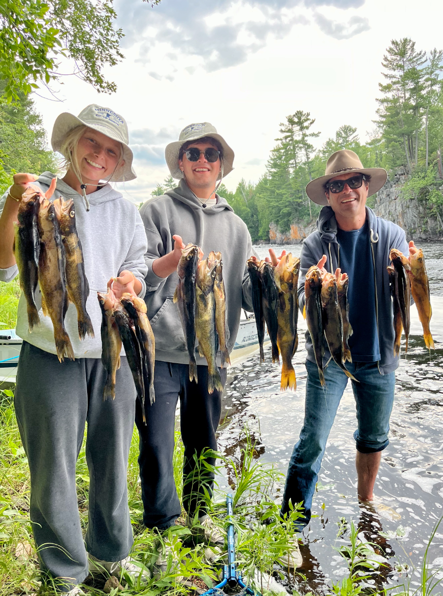 A full stringer of walleye headed for shore lunch